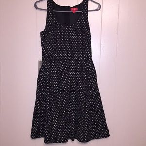 ELLE Black sleeveless dress with white polka dots